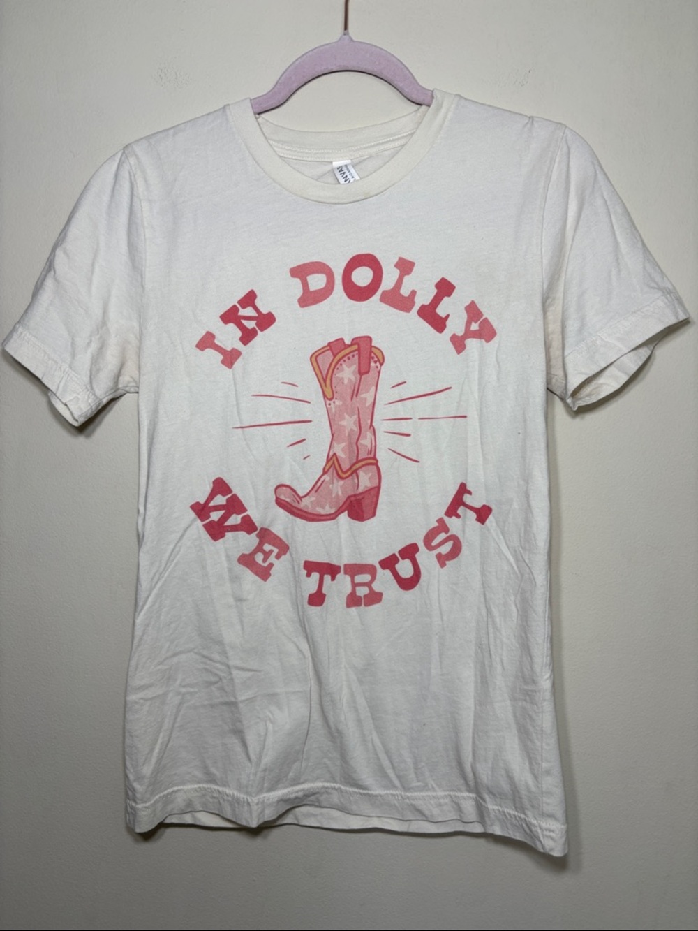 “In Dolly We Trust" Graphic Tee - White with Pink Print